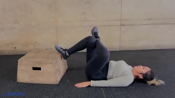 Bodyweight Feet Elevated Figure Four Glute Bridge