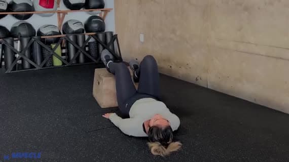 Bodyweight Feet Elevated Staggered Glute Bridge