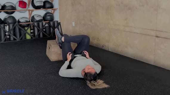 Dumbbell Feet Elevated Figure Four Glute Bridge