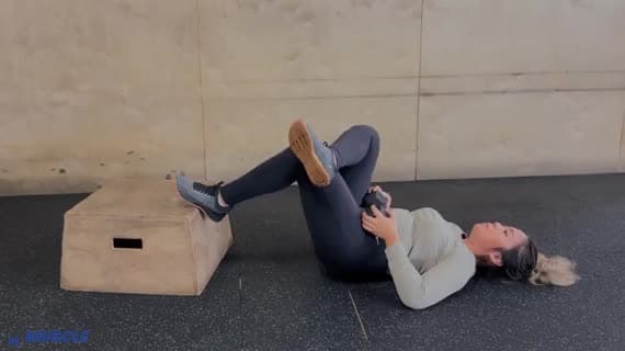 Dumbbell Feet Elevated Figure Four Glute Bridge