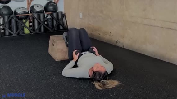 Dumbbell Feet Elevated Staggered Glute Bridge