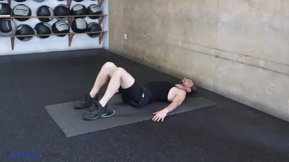 Curl femoral con deslizador a una pierna