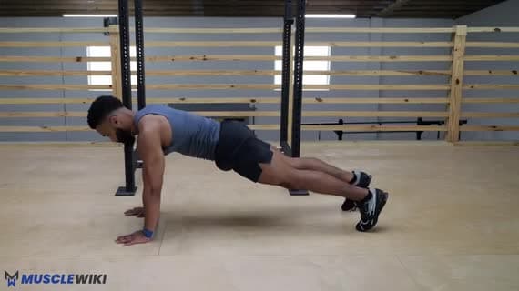 Mini Band Plank Hand Step Out