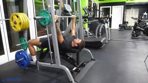 Smith Machine Bench Press Exercise Guide - Chest Workout | MuscleWiki