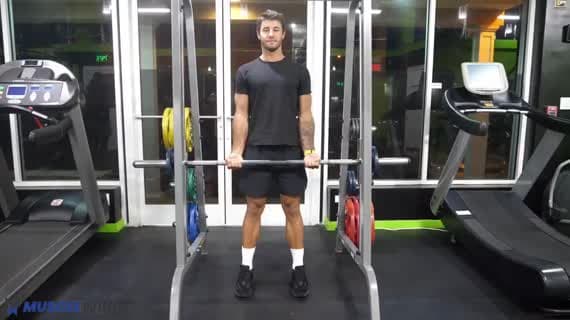 Curl traîné à la Smith machine