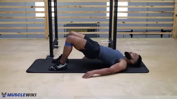 Abdução de quadril deitado com miniband