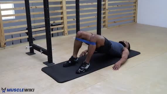 Abdução de quadril deitado com miniband