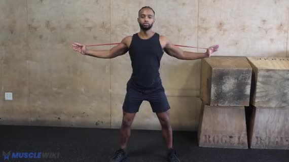 Salto a forbice con elastico cardio