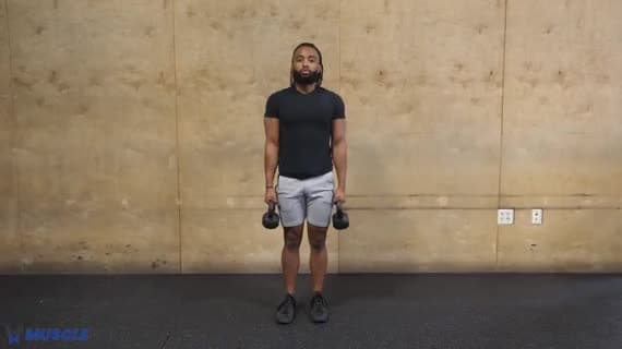 Haussement d'épaules avec kettlebell