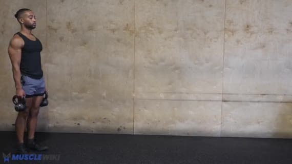 Camminata del contadino con kettlebell