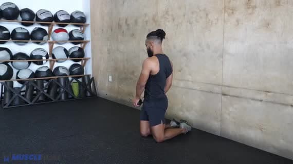 Dumbbell Kneeling Wood Chopper